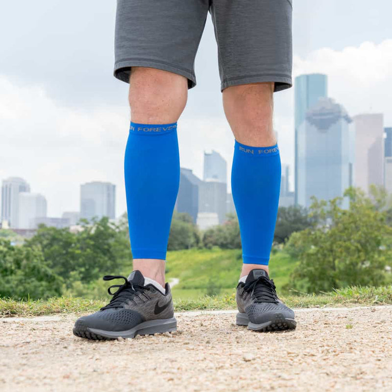 Legs Runner Men In Compression Calf Sleeves And Kneepad Running In City  Stock Photo, Picture and Royalty Free Image. Image 97199323.